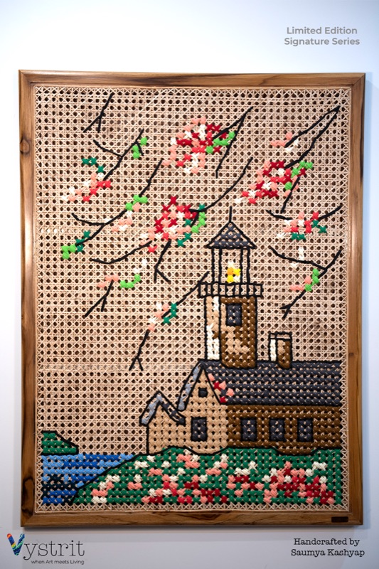A Beacon of Hope: a weathered lighthouse and keeper's house beneath flowering branches, a small boat on the sea at lower left.
